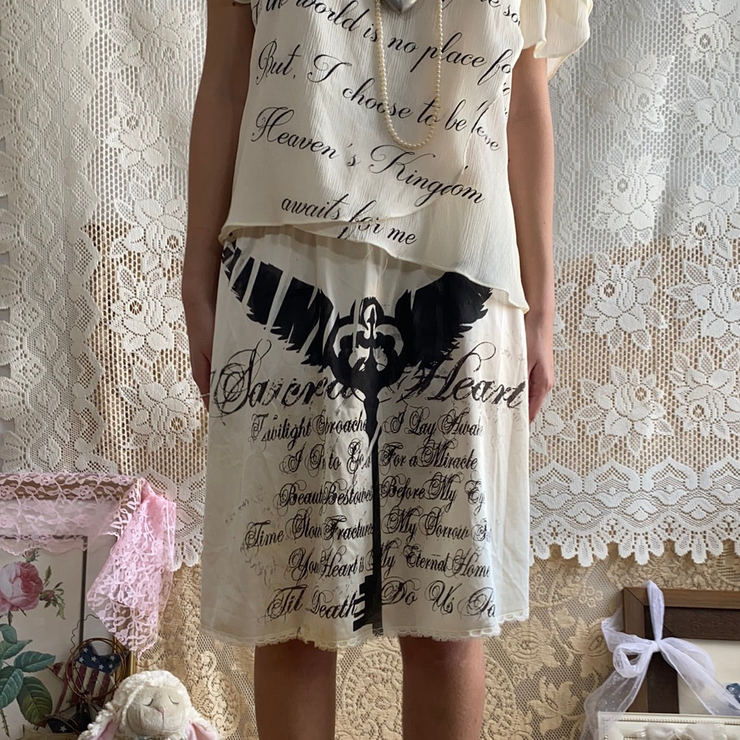 Sacred Heart Creme Mini Slip Skirt